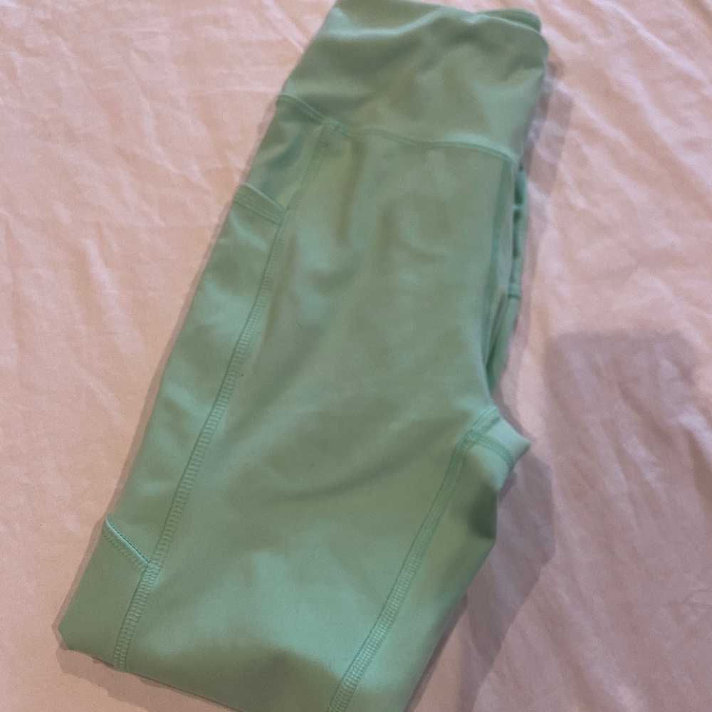 Green leggings